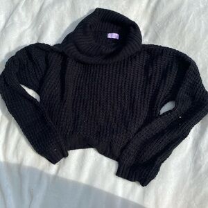 Black, oversized, cropped pink lily sweater